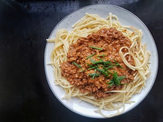 spaghetti with bolognese and fresh chives