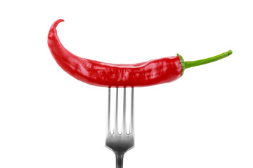 one hot red jalapeno pepper on fork on white background