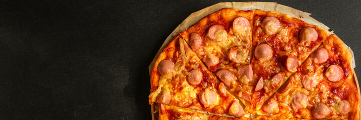 pizza with sausages (tomato sauce, cheese, meat). food background. top view. copy space