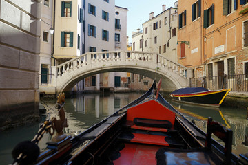 First person view from the venetian gondola while traveling around on the water, Venice, Italy © notsunami