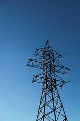 power line tower against the sky