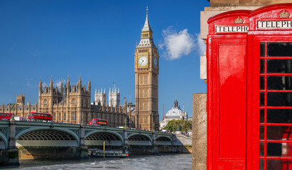 Obraz na płótnie Canvas London symbols with BIG BEN, DOUBLE DECKER BUSES and Red Phone Booths in England, UK