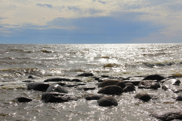 Large waves of sea and stones beach