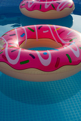 Inflatable rings in house swimming pool for children