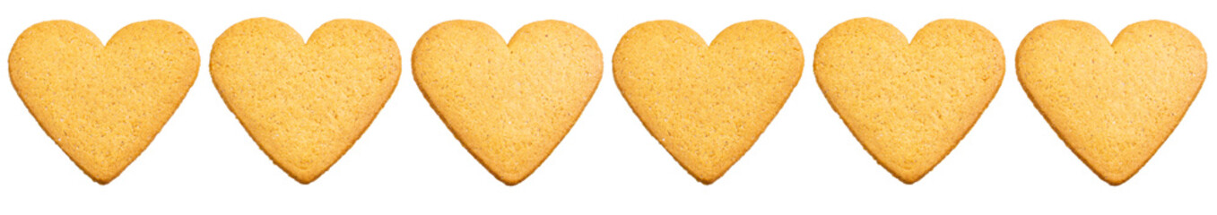 Gingerbread cookie hearts ornament isolated on white background. Sweet dessert pastry cookie heart ornament background pattern