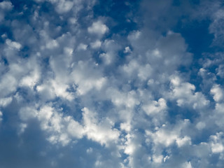 Deep blue sky and white clouds. Day sky in an ecologically clean area with a beautiful view of the clouds. Natural view of nature.
