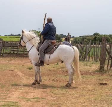 Saint-Bres, France - 06 06 2019: Guardians of bulls on horseback