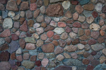 The texture of the concrete wall of natural stone