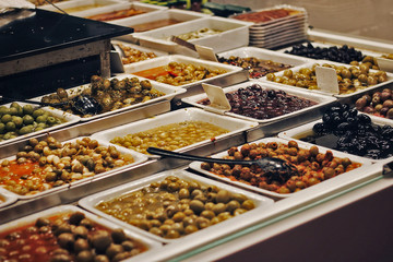 Market stall of olives in Barcelona.