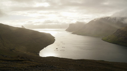 Drangarnir Sea Stack Mountain Hike near Sorvagur during sunset on the Faroe Islands in the Atlantic...