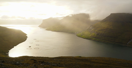 Drangarnir Sea Stack Mountain Hike near Sorvagur during sunset on the Faroe Islands in the Atlantic...