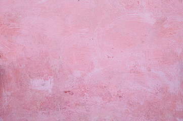 Pink wall of plaster.