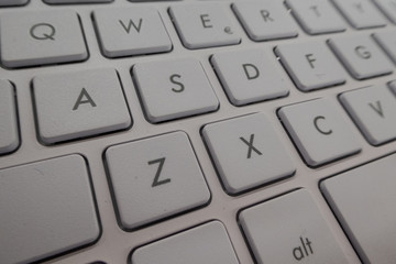 Close-up detail of a QWERTY keyboard of a laptop PC