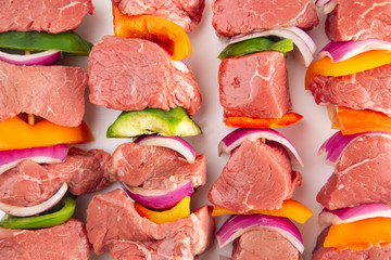 Beef and Veggie Kebabs on a White Background
