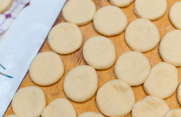 Fototapeta na wymiar The process of making dough Baursak, Kazakhstan, the famous festive food
