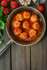 meatballs in tomato sauce (meat dish). food background. top view. copy space