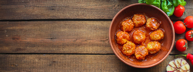 meatballs in tomato sauce (meat dish). food background. top view. copy space