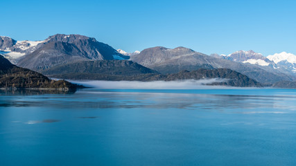 Glacier Bay National Park, Alaska. Spectacular sweeping vista of ice capped/ snow covered mountains, glaciers, wildlife landscape. Absolutely breathtaking natural untouched serene nature views.