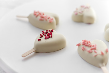 Obraz na płótnie Canvas Popsicle mousse cakes for St. Valentine's Day