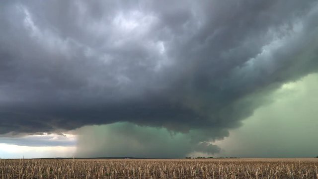 Time lapse of severe tornado warned storm moving across the plains viewing green hail core as it moves through Nebraska.