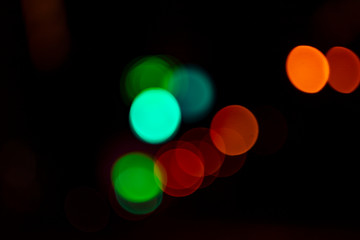 Multicolored vintage bokeh on black background