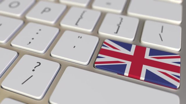 Key with flag of Bahrain on the computer keyboard switches to key with flag of Great Britain, translation or relocation related animation