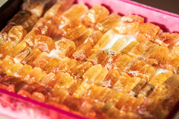 close up on imperial topaz, raw mineral