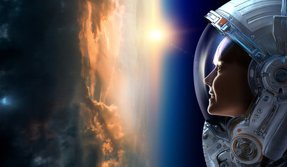 Female astronaut in space on planet orbit.