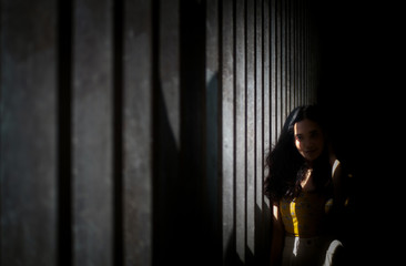 Woman in the shadows There was a light across her face.