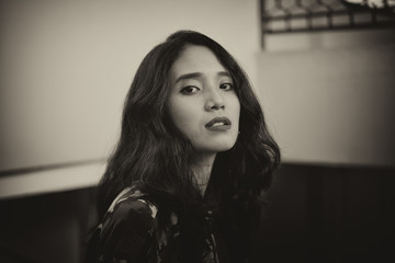 Close-up of the woman's face black and white retro image