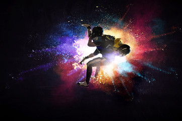 American football players in action. Mixed media
