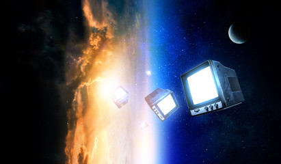 Obraz na płótnie Canvas Retro TV flying in space
