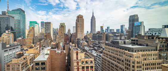 Panoramic view of Manhattan skyscrapers, New York city, cloudy spring day