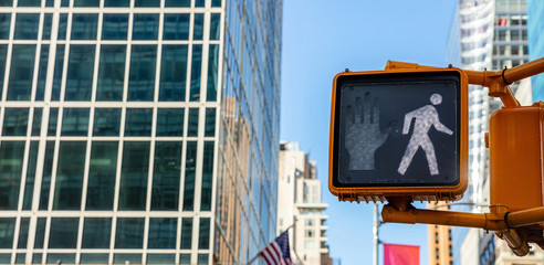 Walk traffic sign for pedestrians, blur office buildings background