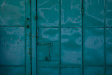 The green painted steel door