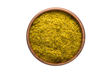 khmeli suneli spice in wooden bowl, isolated on white background. Seasoning top view