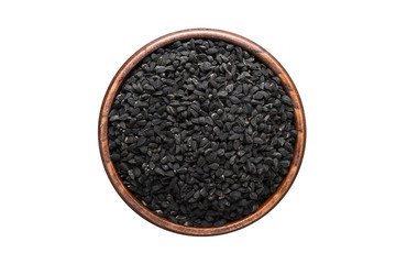 Nigella or Black cumin seeds spice in wooden bowl, isolated on white background. Seasoning top view