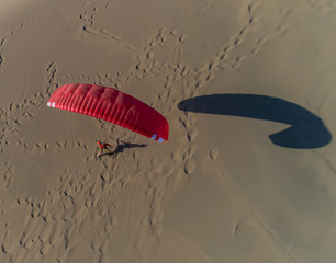 paraglider on the background of sand dune, top view