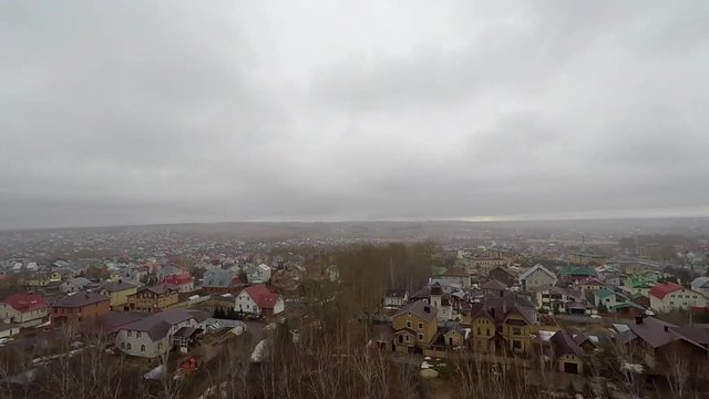 time laps clouds under village 