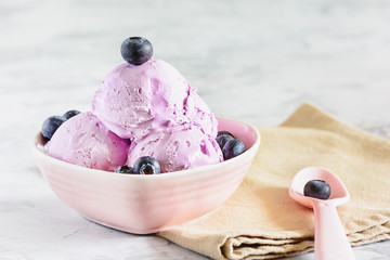 Violet Sweet Ice Cream with Blueberry in Bowl. Three Ball of Ice-Cream with Fruit in Purple Vase. Portion of Frosting Sorbet. Berry in Spoon. Delicious Freezing Dish. Frosting Creamy Dessert