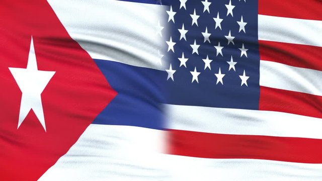USA and Cuba politicians exchanging top secret envelopes, flags background