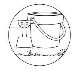 shovel and bucket toy in beach