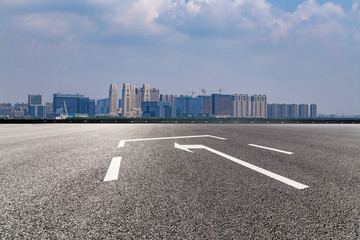 Fototapeta premium Panoramic skyline and modern business office buildings with empty road,empty concrete square floor
