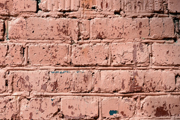 Old brick wall brown color painted texture close up. Abstract background