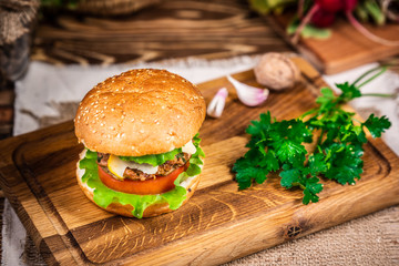 Burger with cheese and salad