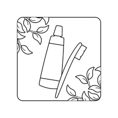 cream tube and toothbrush with leafs in frame
