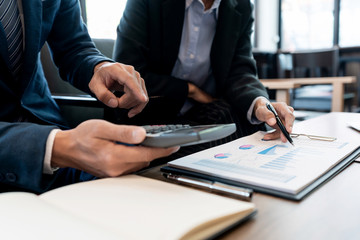 business people and coworker colleagues discussing explanations about week working plan project cooperating in modern coworking office.