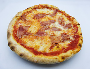 Pizza with ham and mozzarella, pizza al prosciutto, traditional italian food on white background