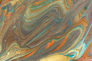 Bronze and gold marbling pattern. Golden marble liquid texture.