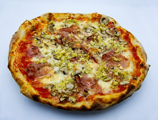 Pizza capricciosa, pizza alla capricciosa, traditional italian food on white background